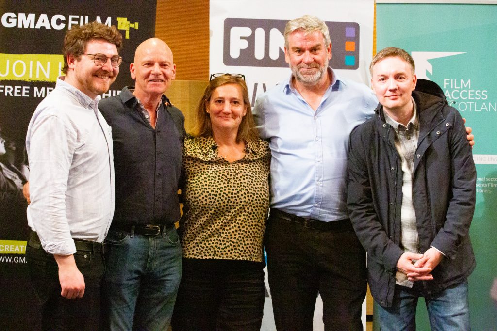 The image shows, from left to right, Matthew Hall (Development Manager, Film Access Scotland), Iain Shaw (Development Team and Managing Director, Media Education), Natalie Usher (Chief Executive, Film Access Scotland), Murray Dawson (Chief Executive, shmu) and Graham Fitzpatrick (Development Officer, Screen Education Edinburgh). 